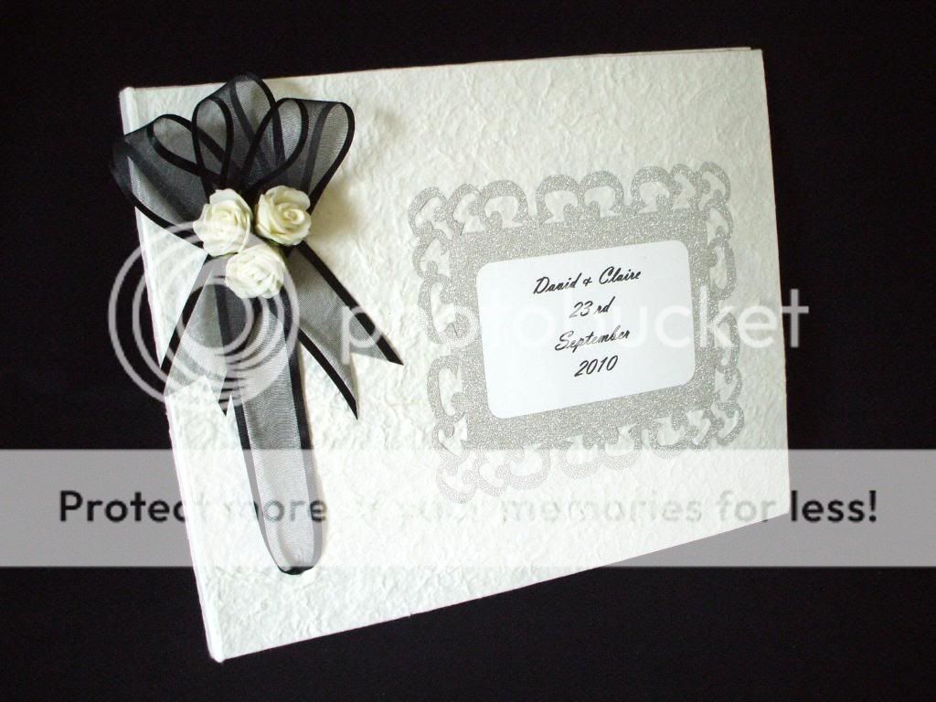 Download this Ivory Wedding Guest Book picture